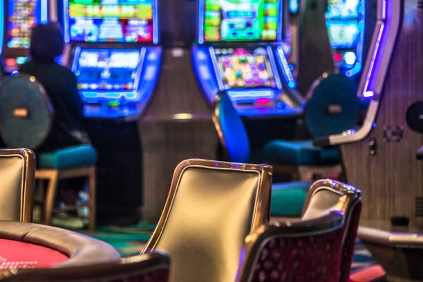 Ganesha Gold slot game interface showing five reels and payout table